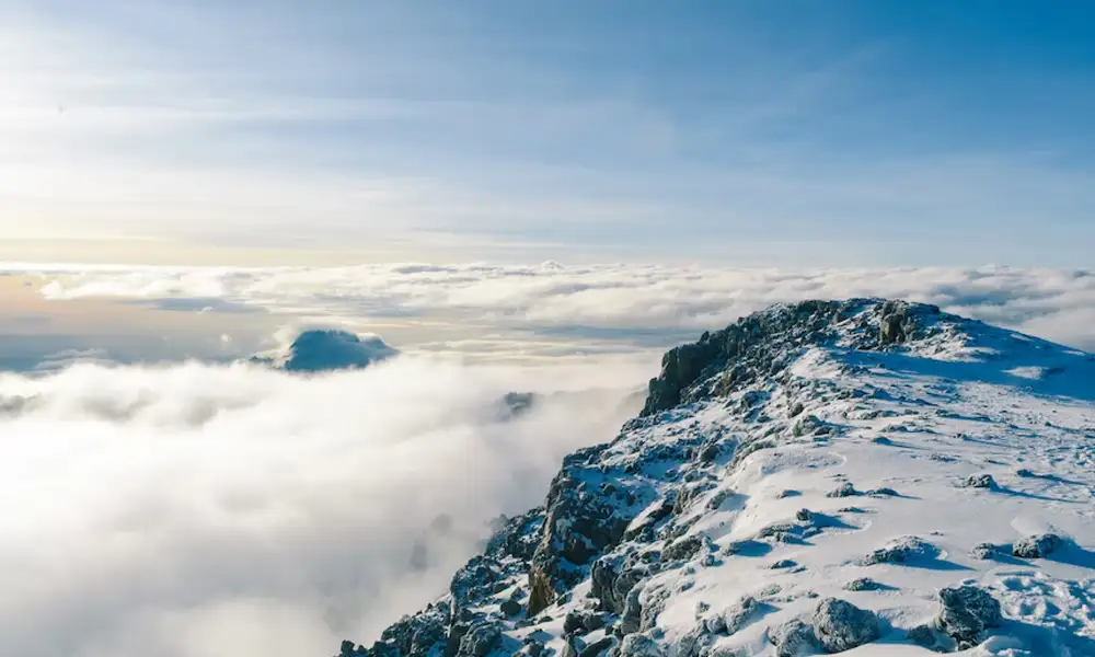 Summit Mount Kilimanjaro, one of the seven summits of the world at 19,340′